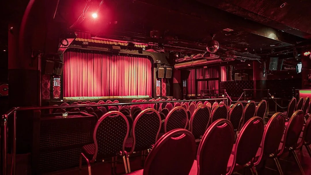 City Hall Theatre seating and stage for Flamenco show.