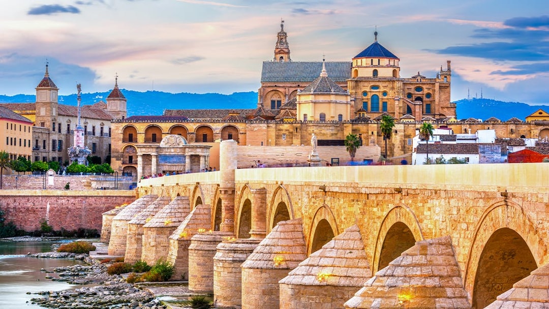 Roman Bridge and Mosque-Cathedral in Cordoba, Spain skyline.