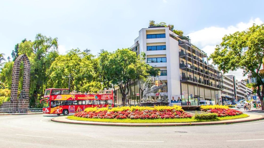 City Sightseeing bus at Rotunda do Infante Fountain, Funchal.