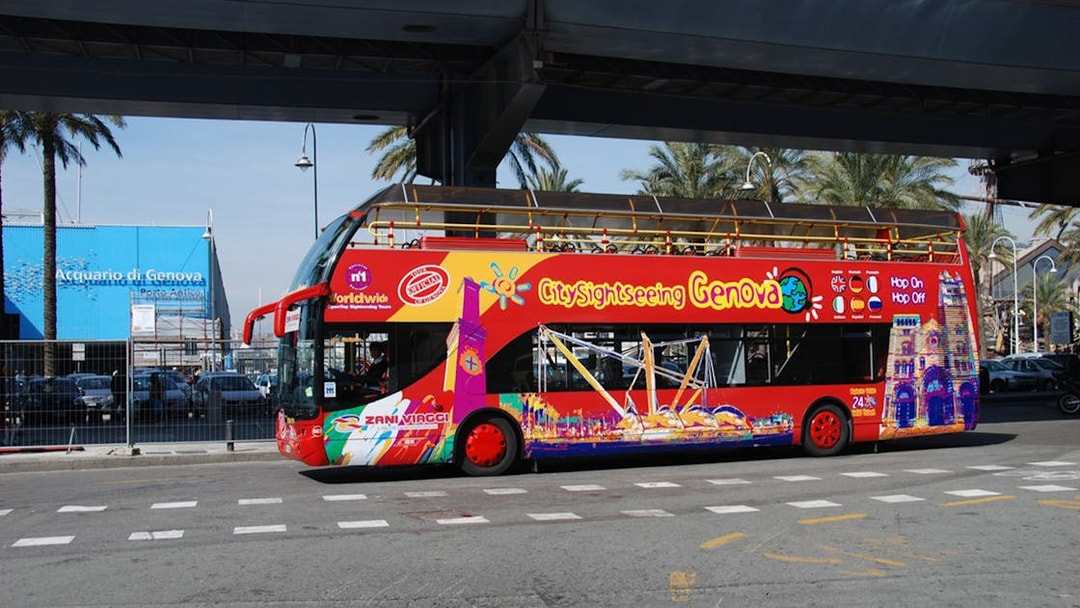Hop-on-hop-off sightseeing bus in Genoa near Acquario di Genova.