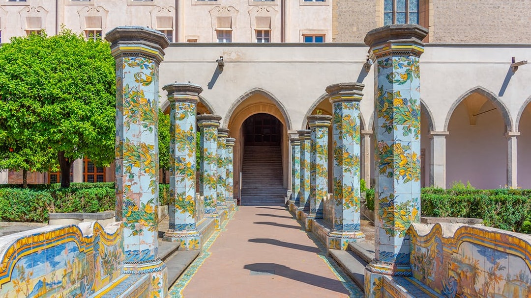 Colorful ceramic columns in the cloister of Santa Chiara, Naples.