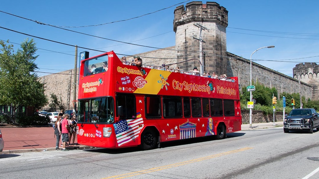 Open-top tour bus in front of Eastern State Penitentiary, Philadelphia.