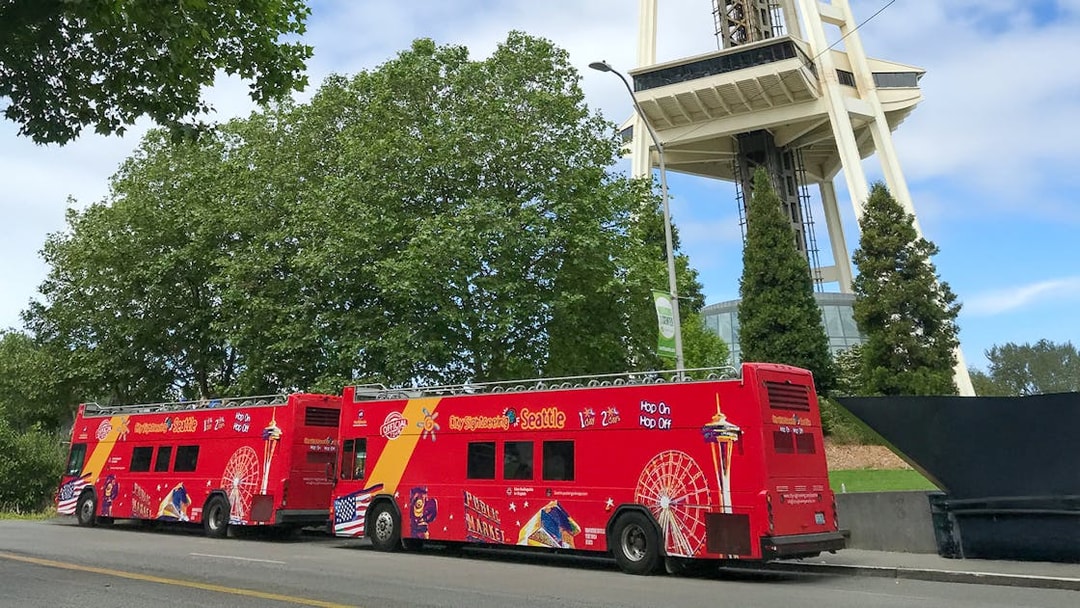 City Sightseeing bus at Seattle bus stop near Space Needle.