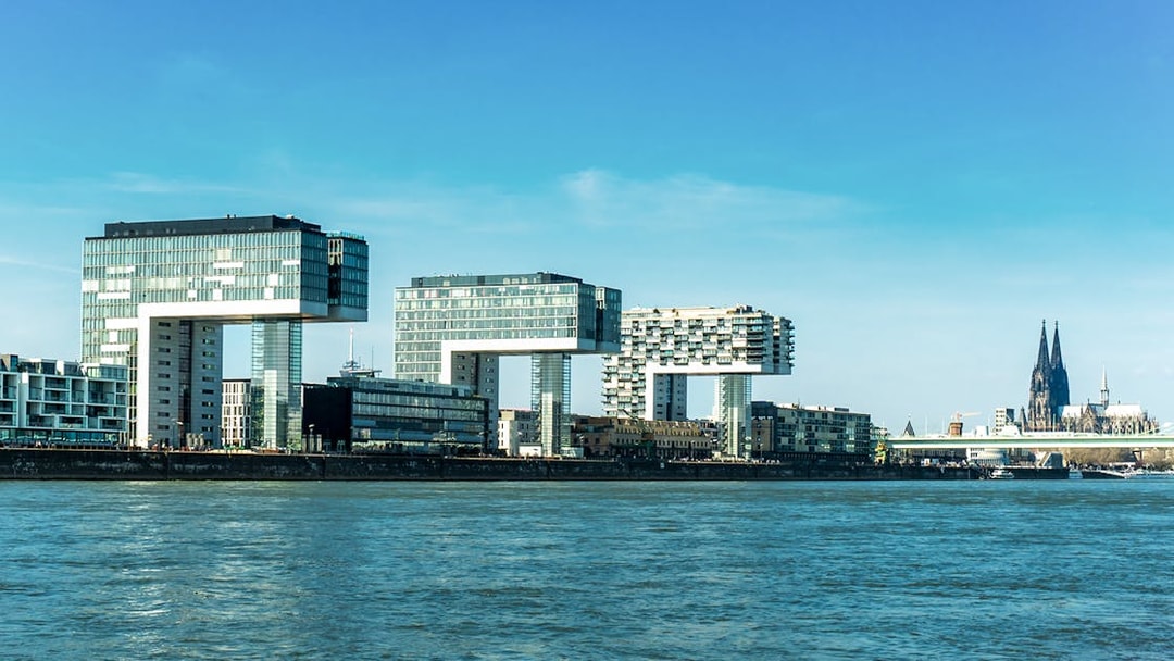Kranhäuser buildings and Cologne Cathedral viewed from the Rhine River.