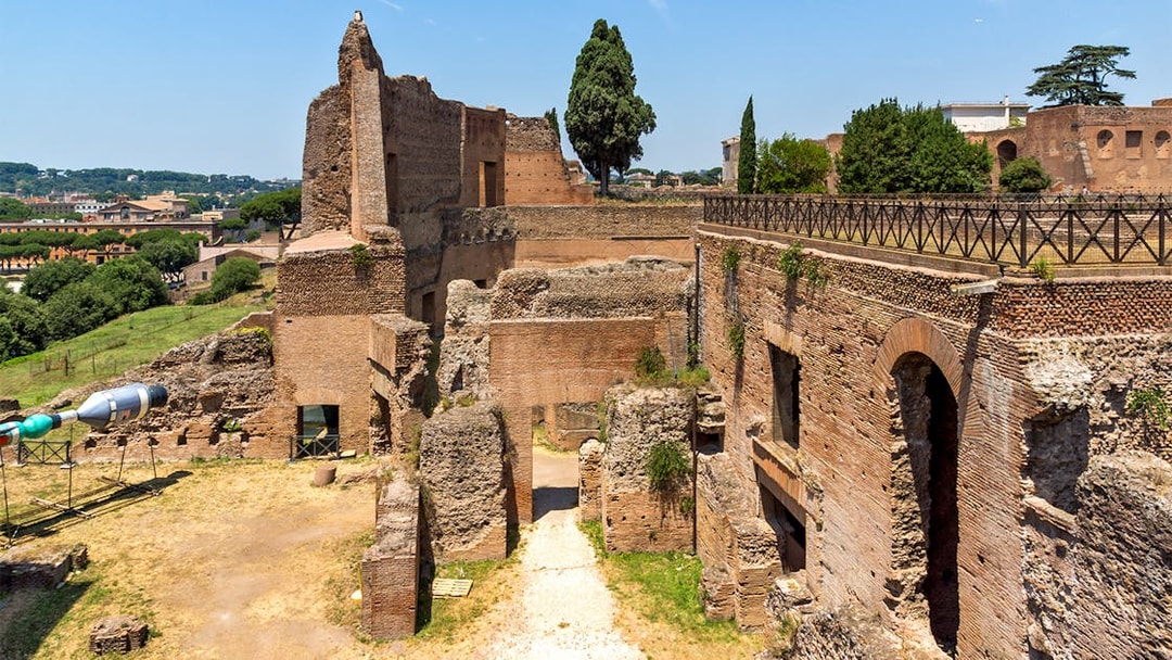 Roman Forum ruins and Palatine Hill landscape in Rome, Italy.