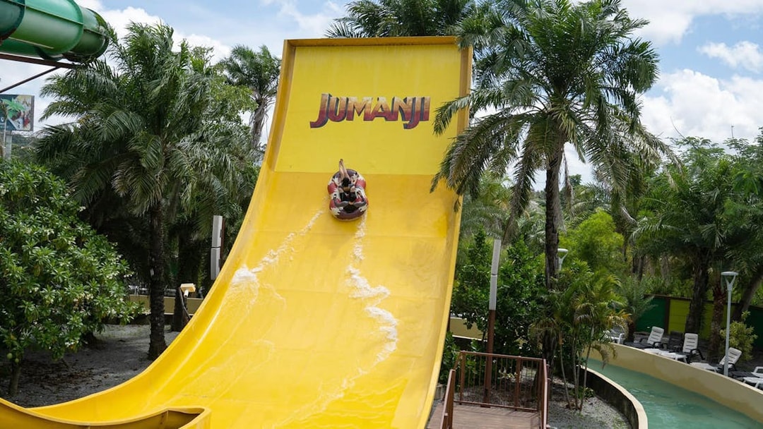 Visitors on a water slide at Jumanji attraction, Columbia Pictures Aquaverse Pattaya.