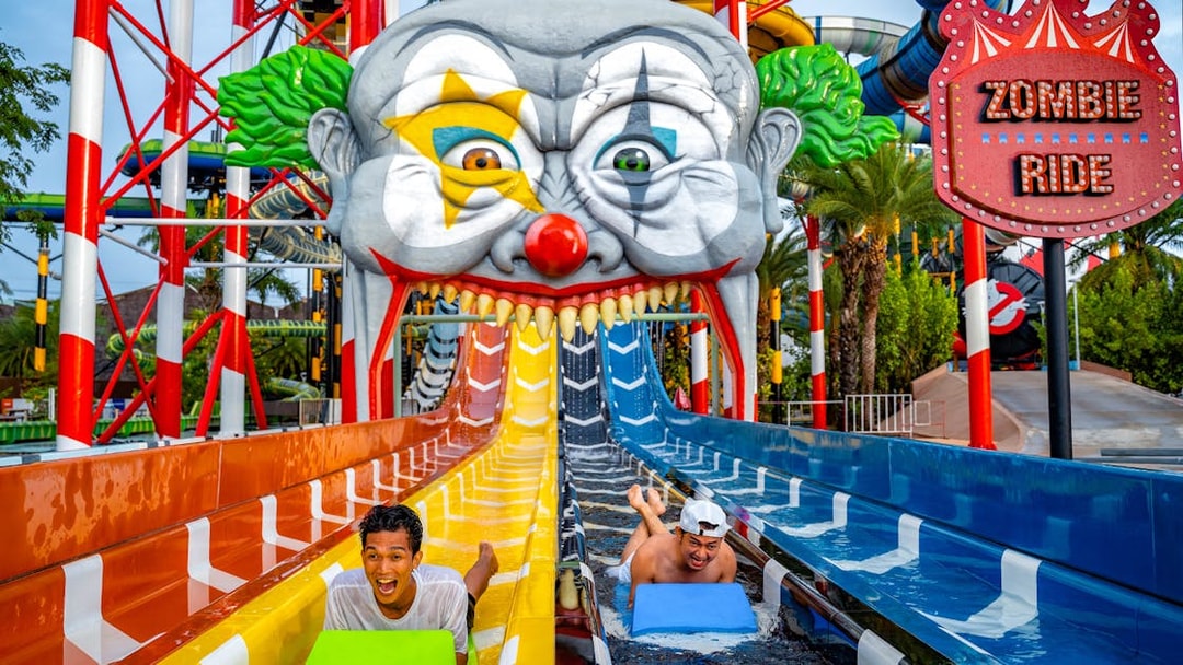 Water slide at Zombieland, Columbia Pictures Aquaverse Pattaya, with riders enjoying the thrill.
