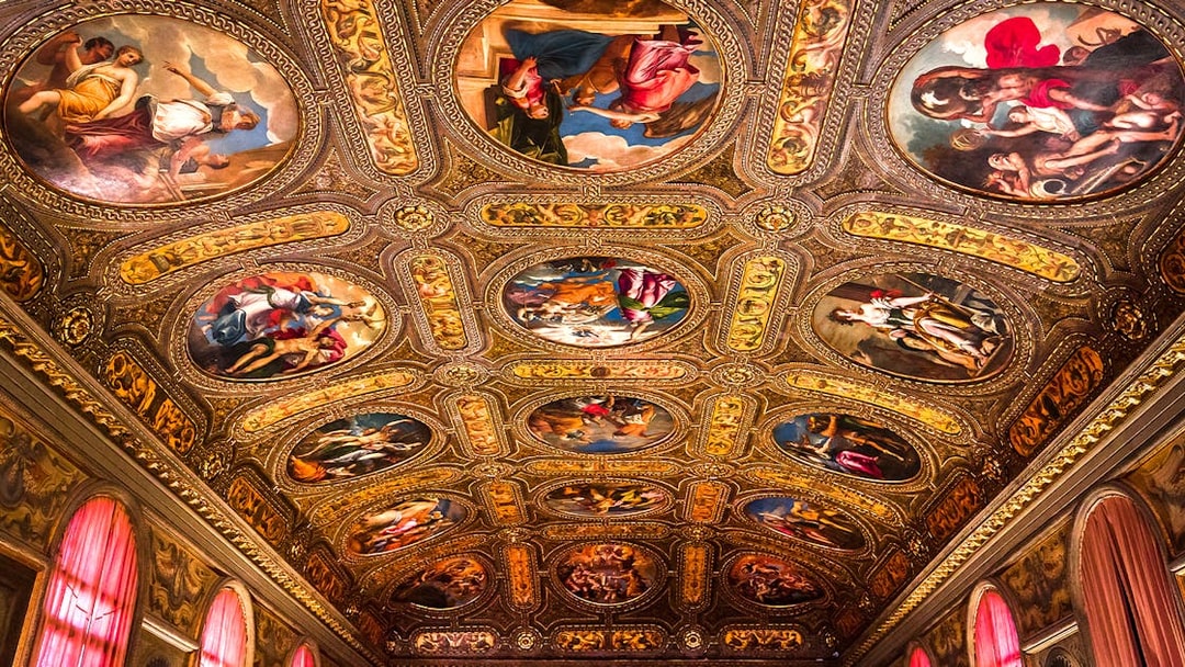 Ceiling frescoes and ornate details in Biblioteca Marciana, Venice, Italy.