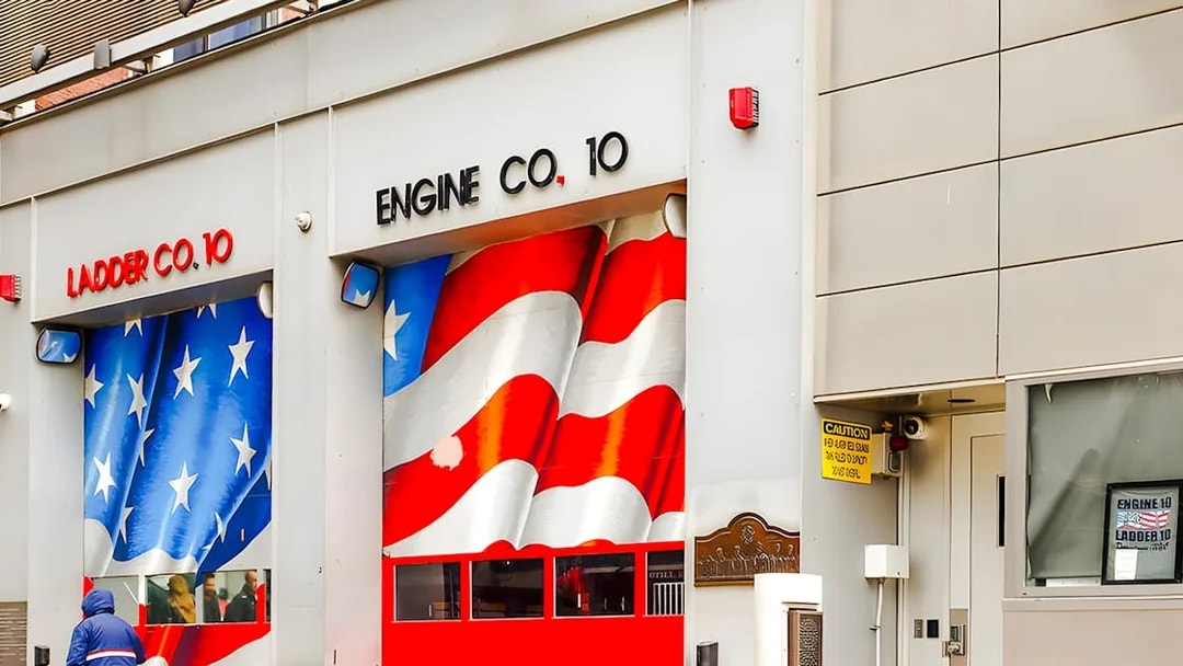FDNY Ten House with American flag mural on garage doors, New York City.