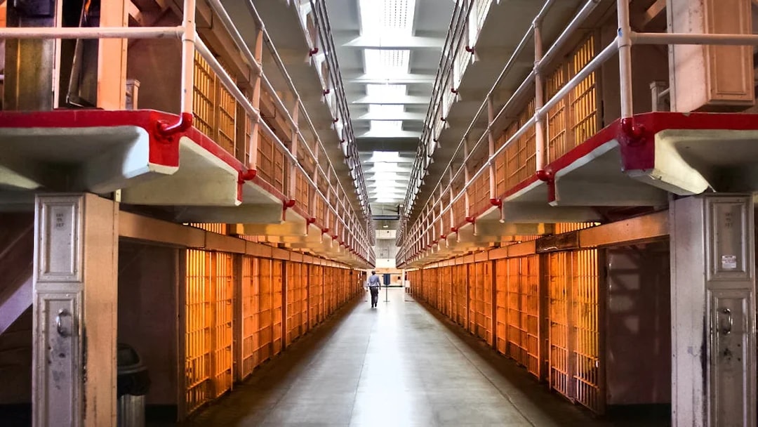 Alcatraz Prison cell block interior during San Francisco Bay cruise tour.