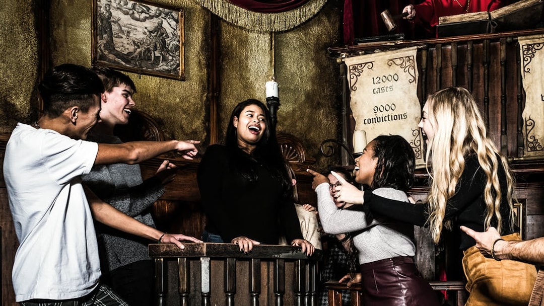 Participants in a mock trial at The Council of Blood play, Amsterdam Dungeon.