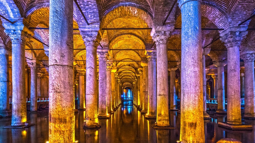 Basilica Cistern's illuminated columns in Istanbul, part of Combo Tour with Blue Mosque and Hagia Sophia.