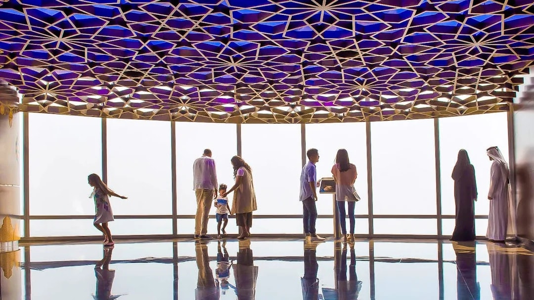 Visitors enjoying the view from Burj Khalifa observation deck, Dubai.