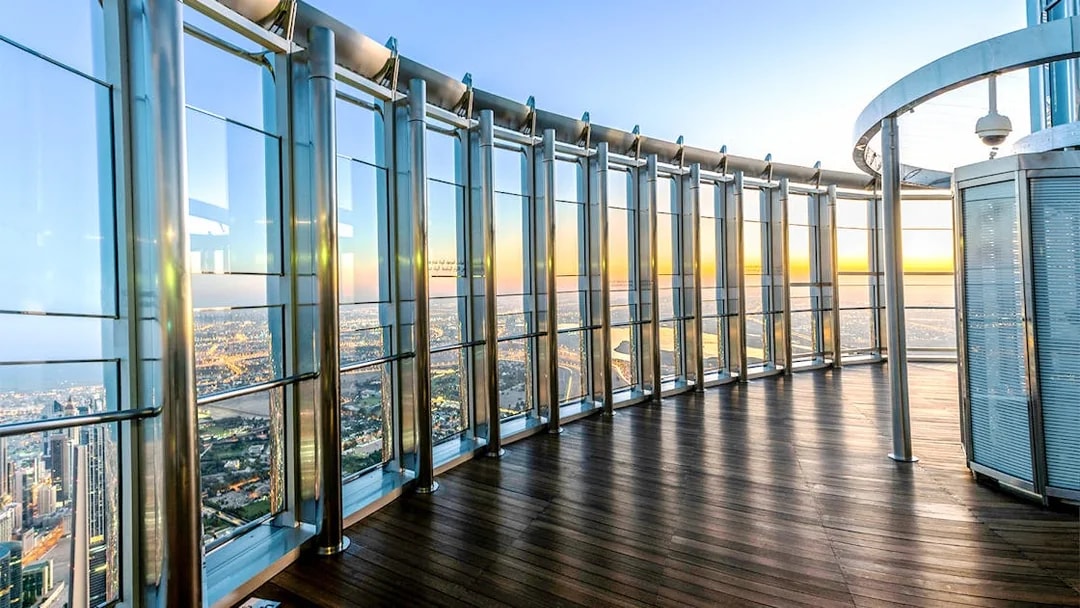 Observation deck view from Burj Khalifa At The Top, overlooking Dubai cityscape.