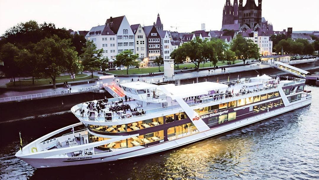Cruise ship on the Rhine River with Cologne Cathedral in the background during a 1-hour city cruise.