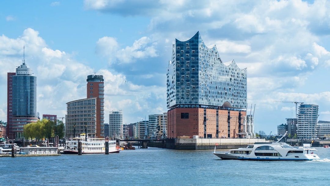 Hamburg harbor cruise with Elbphilharmonie and city skyline in the background.