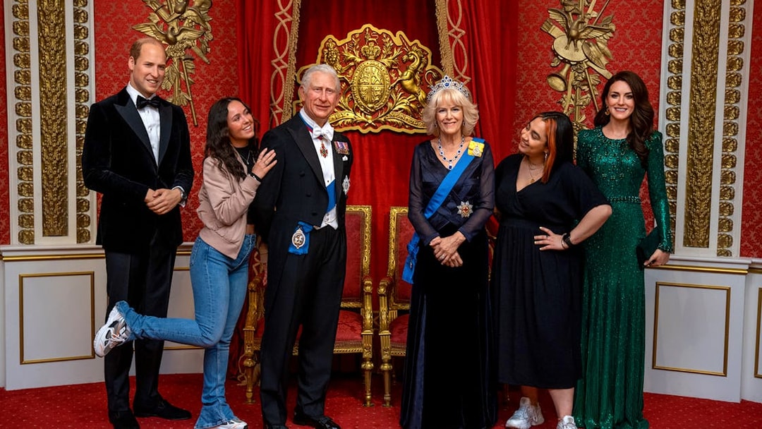 Wax figures of King Charles III and Queen Camilla at Madame Tussauds, part of Harry Potter Studio Tour combo.