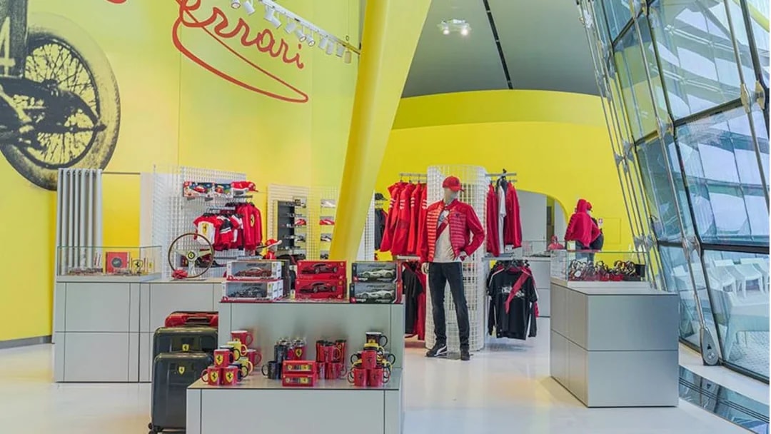 Ferrari merchandise display at Maranello Ferrari Museum shop.