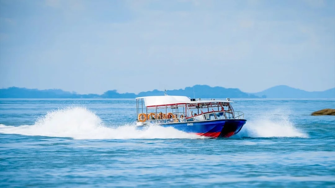 Speedboat tour on open water, part of Combo Mega Adventure in Singapore.