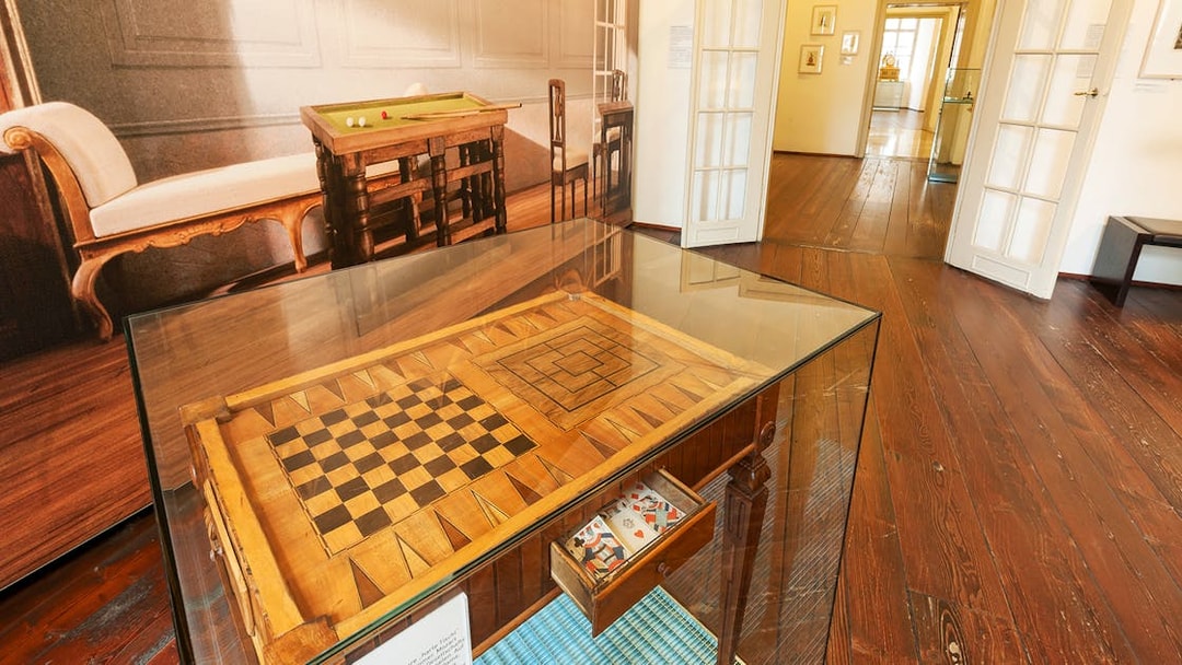 Mozarthaus Vienna interior with historical game table display.
