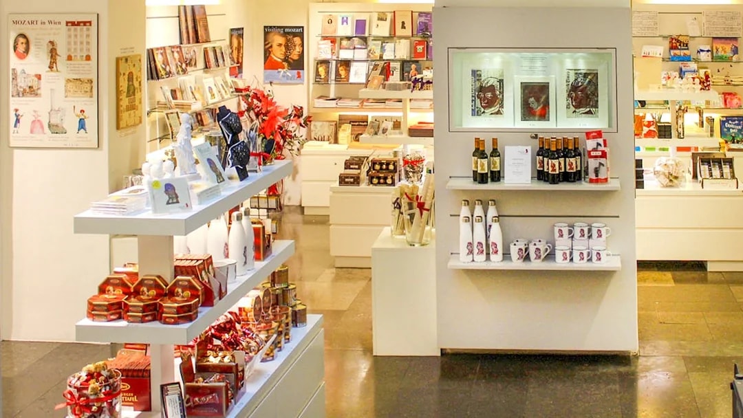 Mozarthaus Vienna gift shop with Mozart-themed souvenirs and books on display.