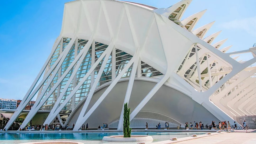 Valencia Science Museum exterior with visitors and modern architecture.