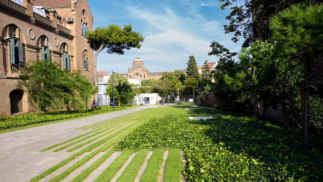 Recinto Modernista de Sant Pau gardens with historic architecture in Barcelona.