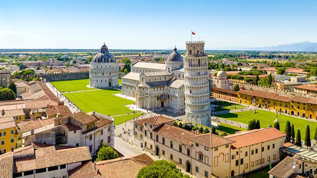 Aerial view of Square of Miracles, Pisa, featuring the Leaning Tower and cathedral.