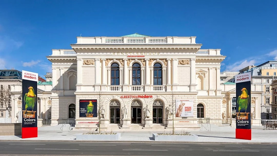 ALBERTINA MODERN museum entrance in Vienna with colorful art banners.