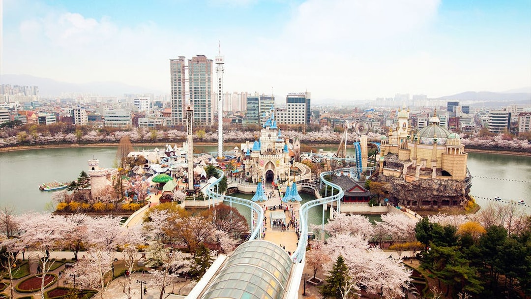 Lotte World amusement park and Seoul cityscape view from Seoul Sky Observatory.