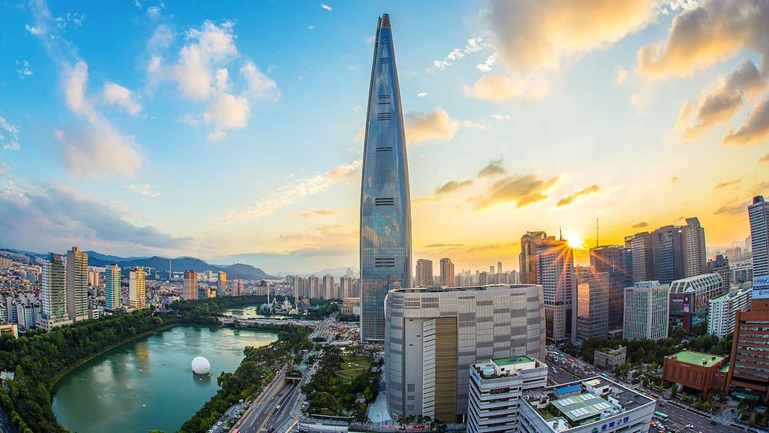 Lotte World Tower and Seoul skyline at sunset, South Korea.