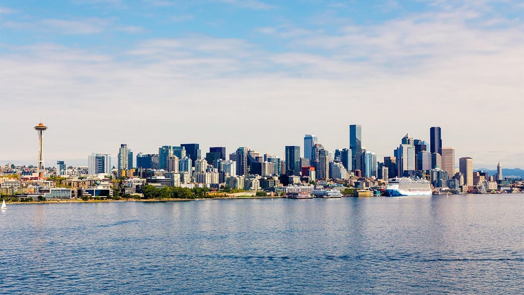 Seattle skyline with Space Needle viewed from a cruise on the water.