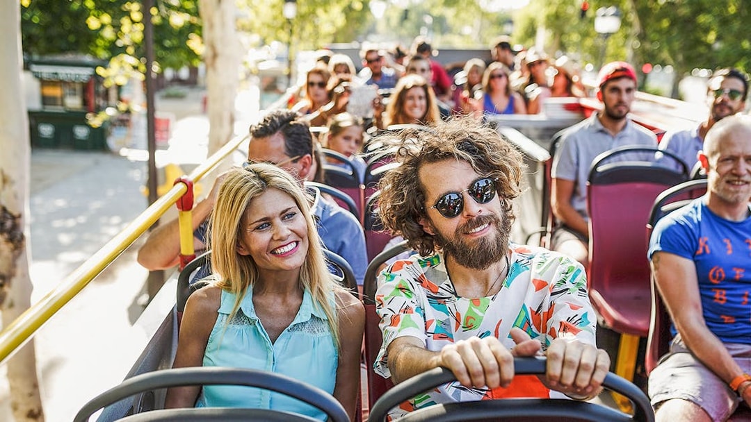 Visitors enjoying a ride on the Seattle Hop-On Hop-Off Bus.