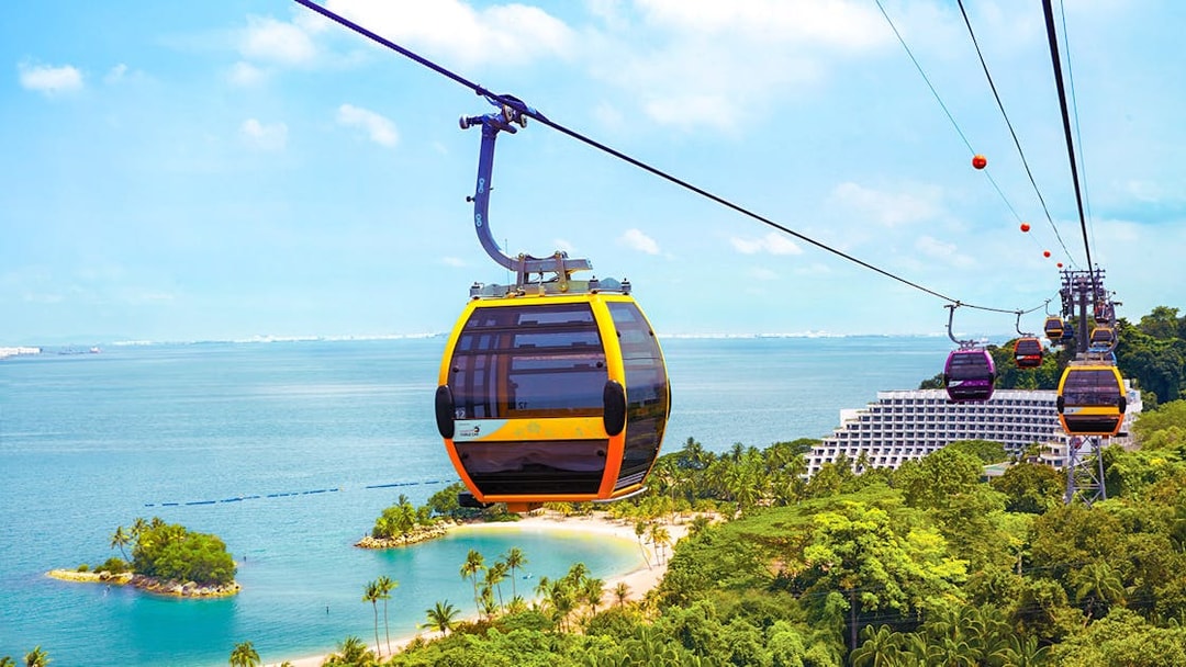 Singapore Cable Car over Sentosa Island with ocean view.