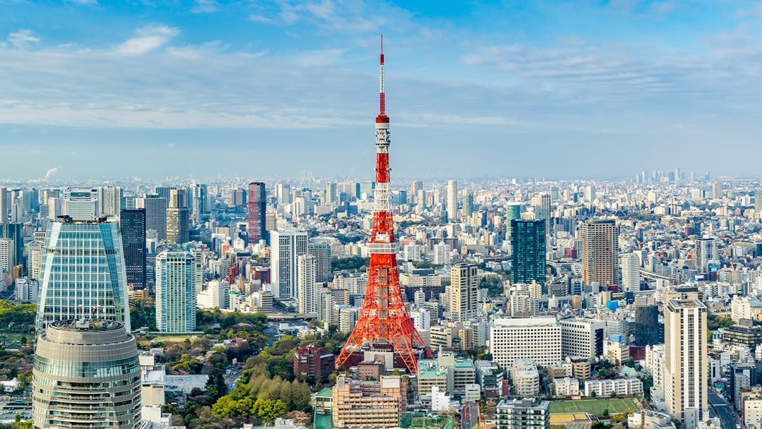 Tokyo Tower amidst cityscape, Tokyo, Japan.