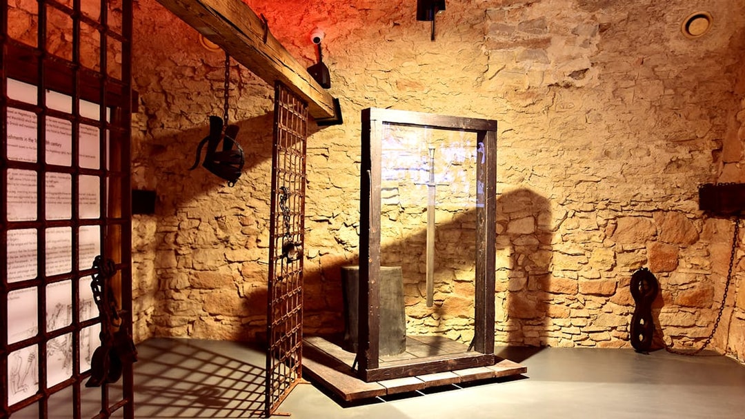 Rynek Underground exhibit with medieval artifacts in Krakow's Old Town.