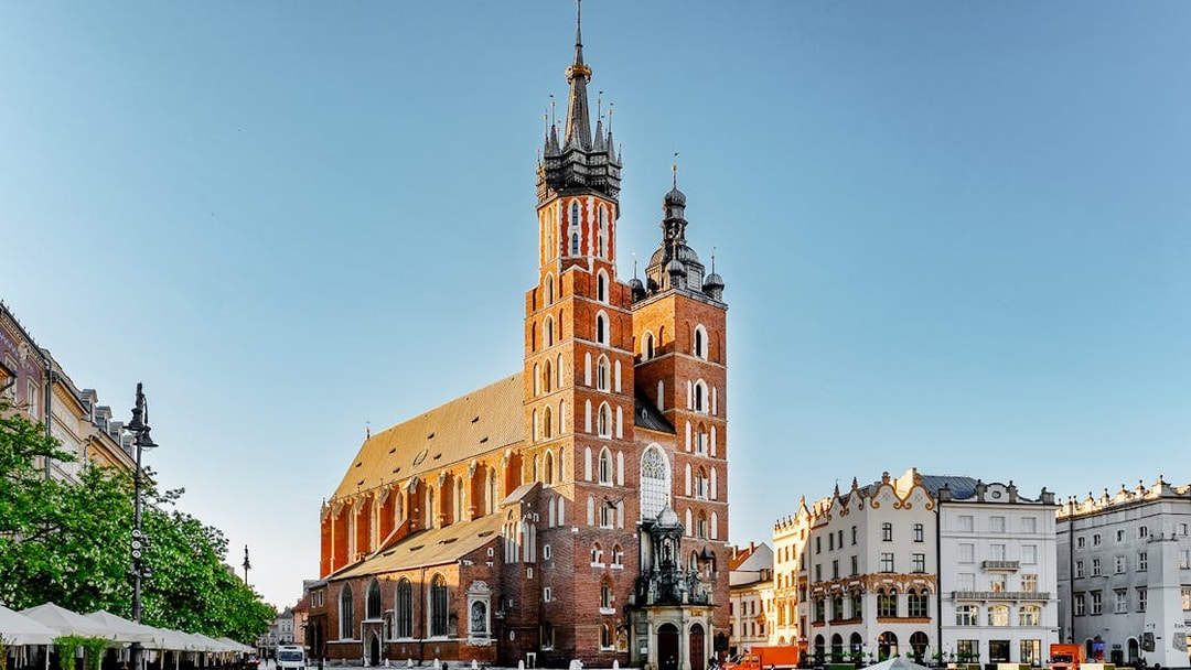 St. Mary's Church in Krakow's Main Square with surrounding buildings.
