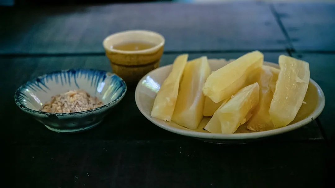 Sugar cane pieces and peanuts in bowls, Cu Chi Tunnel wartime diet.