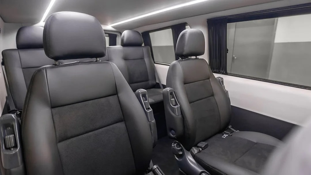 Luxury van interior for private airport transfers.