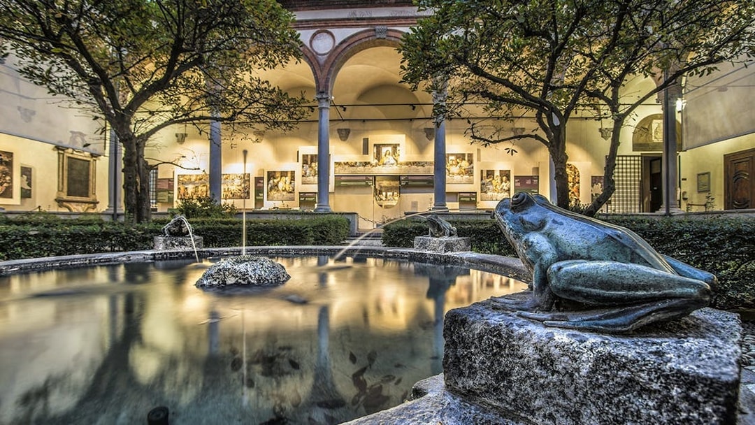 Courtyard with frog statues and fountain near Da Vinci's Last Supper in Milan.