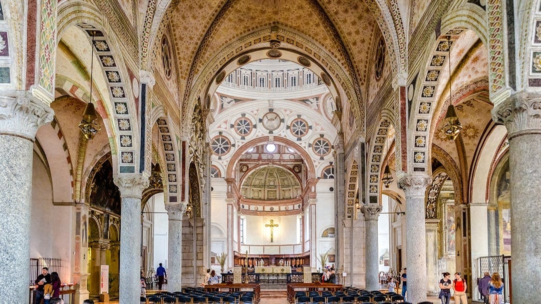 Interior of Church Santa Maria delle Grazie, Milan, showing ornate arches and altar.