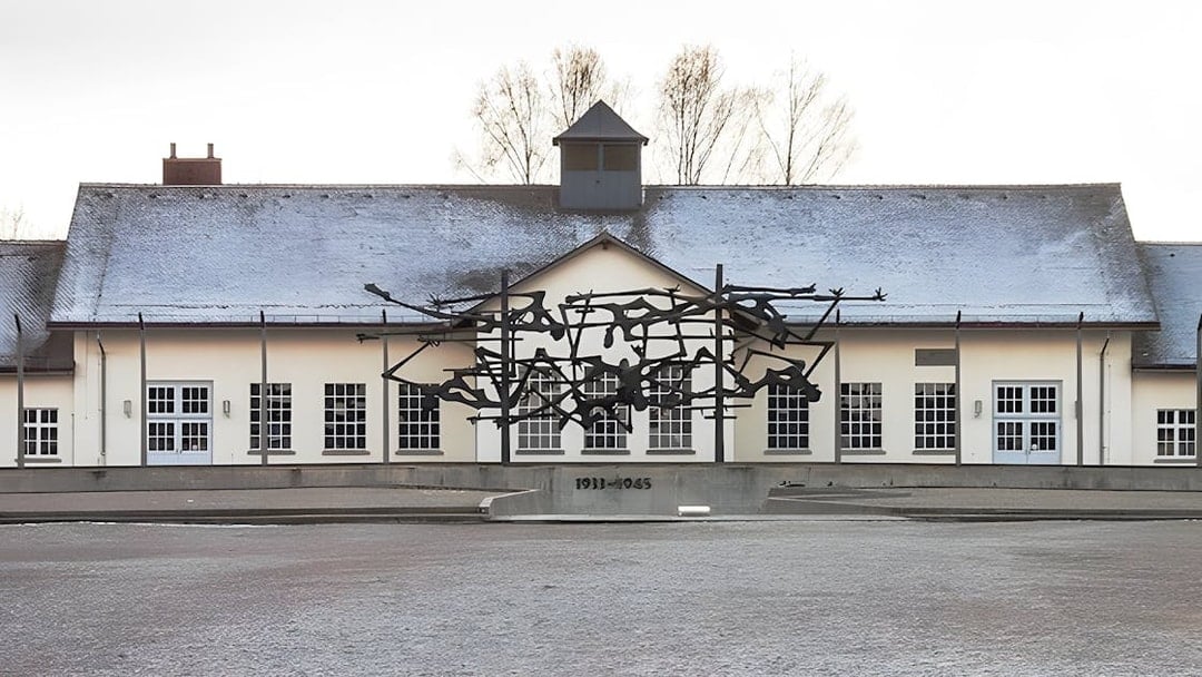Dachau Concentration Camp Memorial sculpture and building facade.