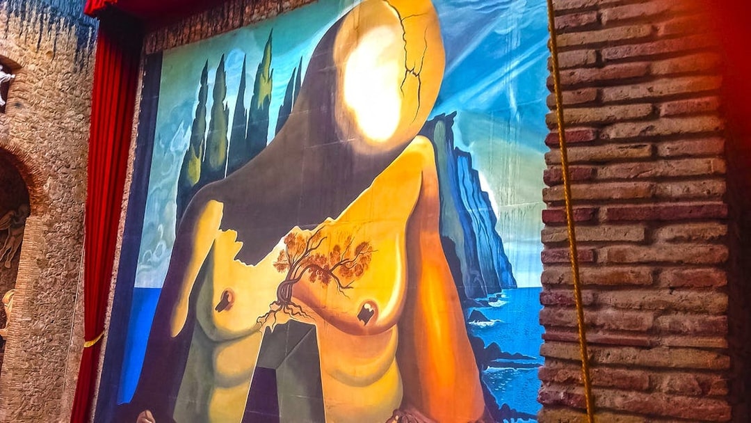 Surrealist painting at Dalí Theatre-Museum in Figueres, featuring abstract human form.