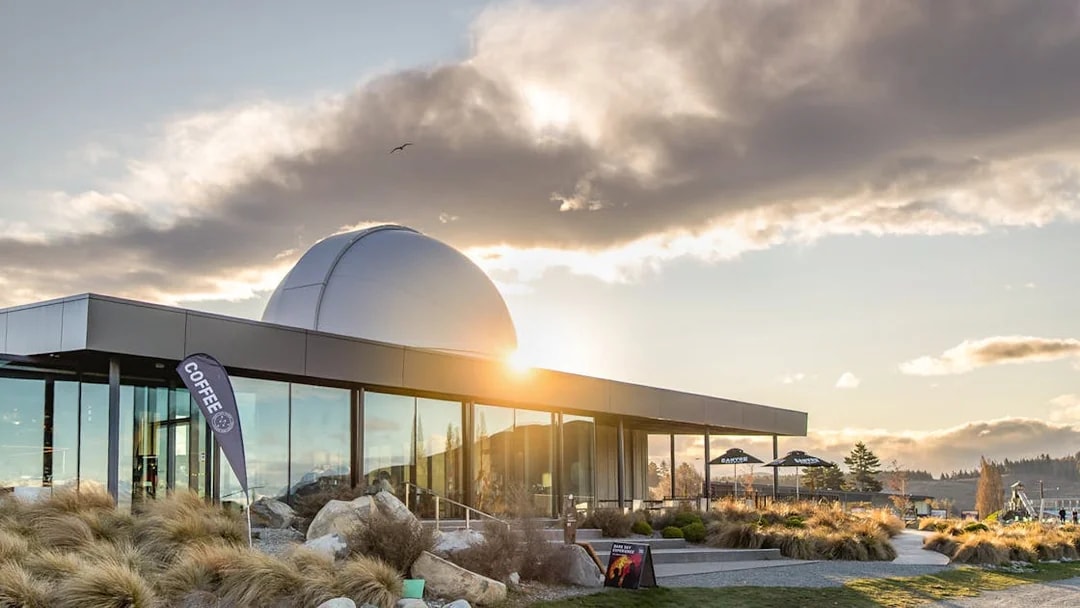 Exterior view of Dark Sky Indoor Cultural Astronomy Experience at sunset.