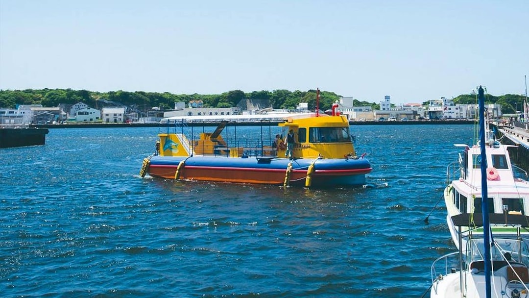 Colorful boat on Misaki port during Keikyu Line day trip.