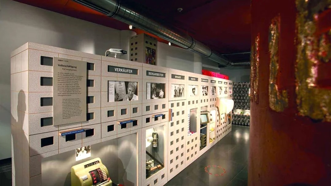 DDR Museum Berlin exhibit showcasing East German life and employment.