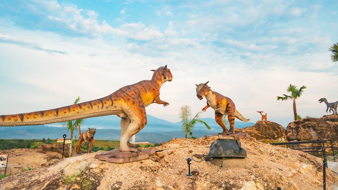 Dinosaurs in a desert landscape at Dino Desert attraction.