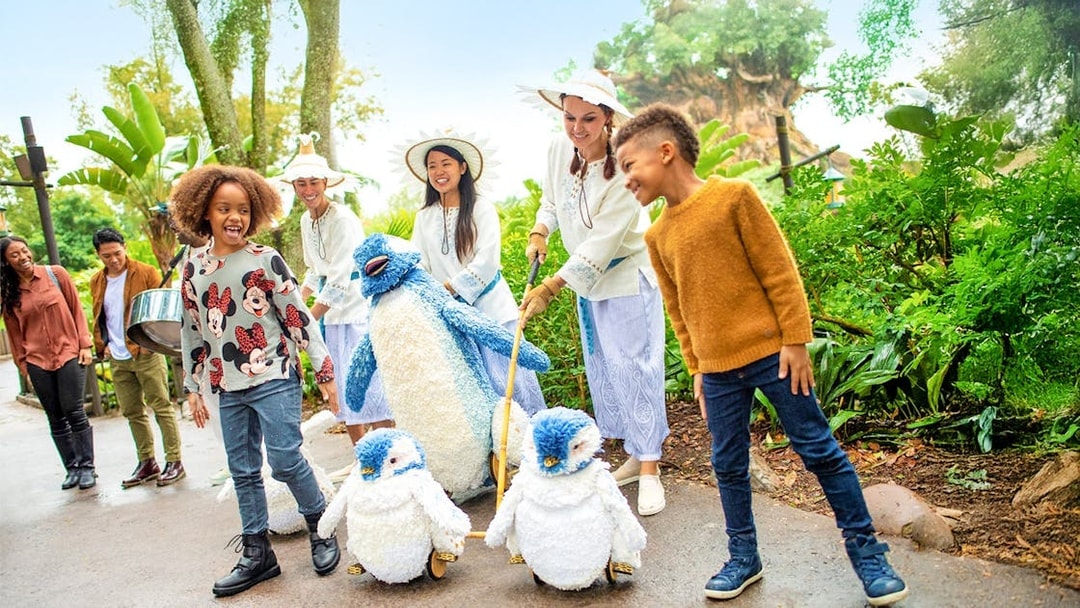 Guests enjoying toy penguins at Walt Disney World Resort, Orlando.
