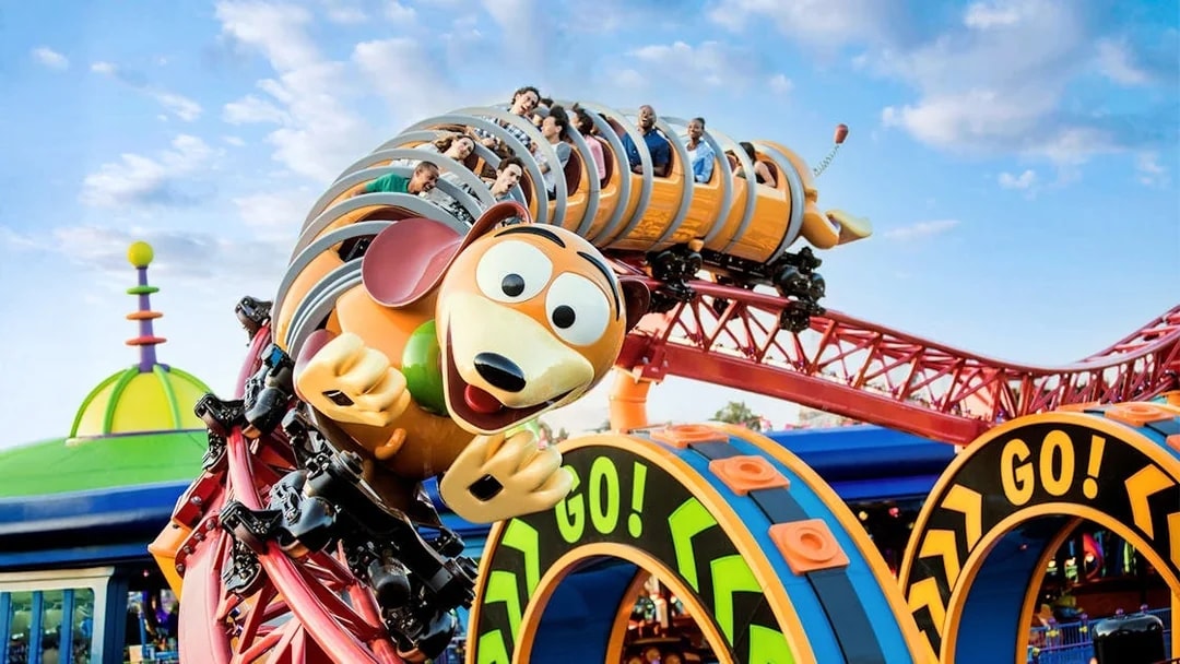 Guests enjoying Slinky Dog Dash rollercoaster at Walt Disney World Resort, Orlando.