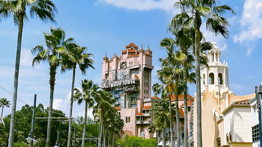 Hollywood Tower at Disney's Hollywood Studios, Walt Disney World, Orlando, surrounded by palm trees.